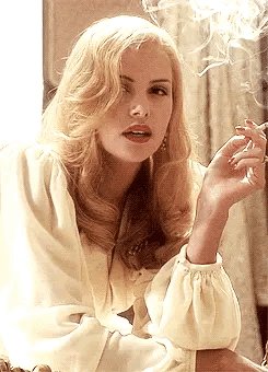 Charlize Theron smocking