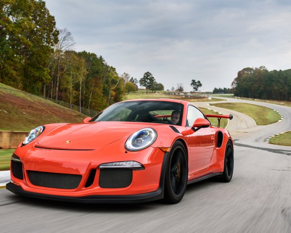 Auto Porsche Orange sports car Porsche 911 GT3 on the t
