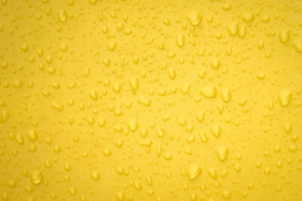 Yellow-droplets-water-texture-background