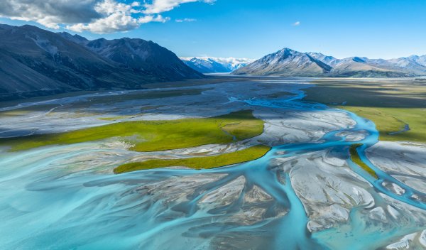 Landscape-river-valley-mountains-new-zealand-sky-green