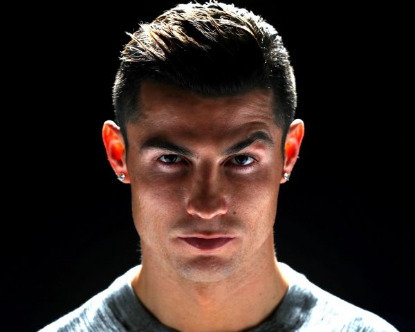 Handsome football player Cristiano Ronaldo photo on blac