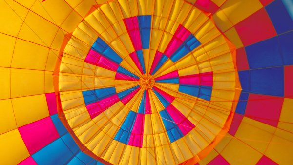 Yellow-hot-air-balloon-colorful-blue-pattern