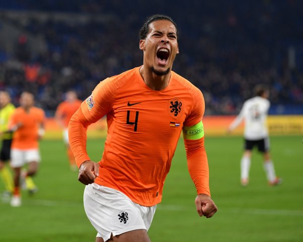 Dutch footballer Virgil van Dijk screaming on the pitch