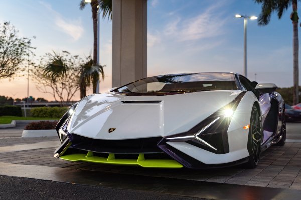 Lamborghini-sian-vag-white-evening-sky-clouds