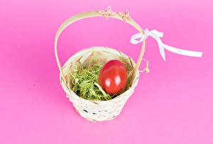 Easter Colored background Wicker basket Eggs 581873 300x203