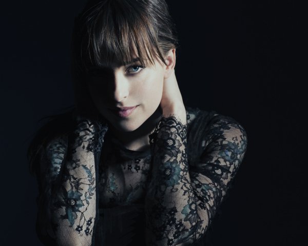 Beautiful young girl actress Dakota Johnson in black att