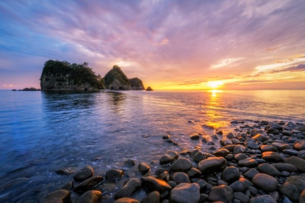 Sea-beach-rocks-clouds-sunset