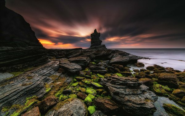 More-volny-nebo-solntse-oblaka-zakat-iarkii-kamni-skaly-be-1