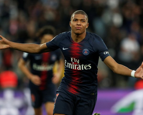 French footballer Kilian Mbappe runs across the field 13