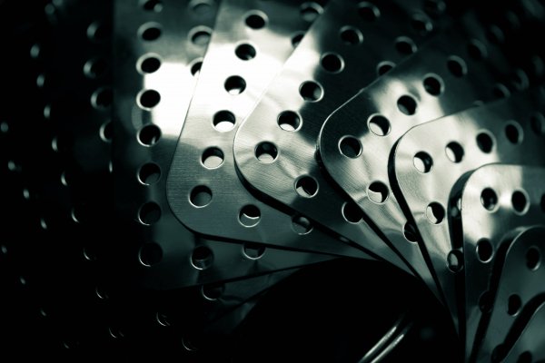 Metal-holes-gray-texture-geometry-industrial