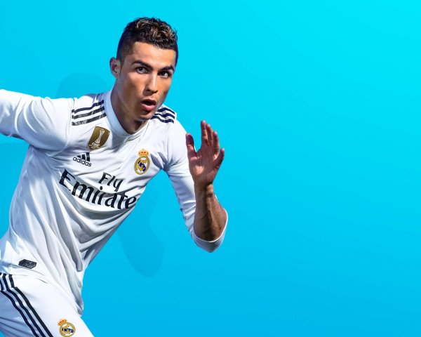 Portuguese footballer Cristiano Ronaldo photo on a blue