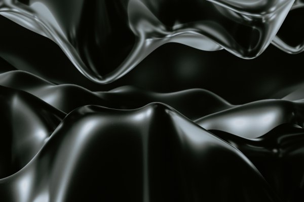 Black-wavy-smooth-metallic-texture