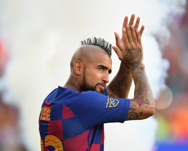 Chilean soccer player Arturo Vidal with tattoos on his b