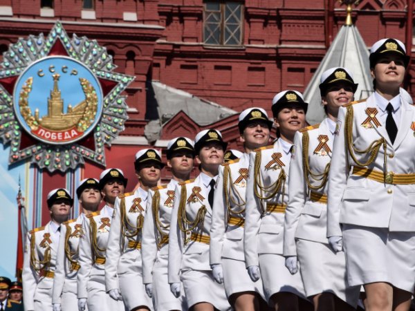 Holidays May 9 Girls in white military uniform on Victo