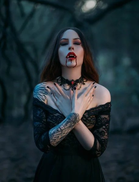 Depositphotos 414508858-stock-photo-attractive-sexy-vampire-