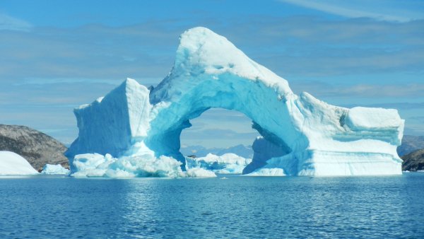 Nature Huge blue iceberg in the ocean 130934